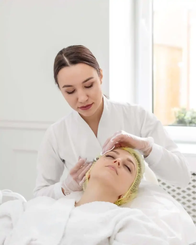 A young women taking skin treatment