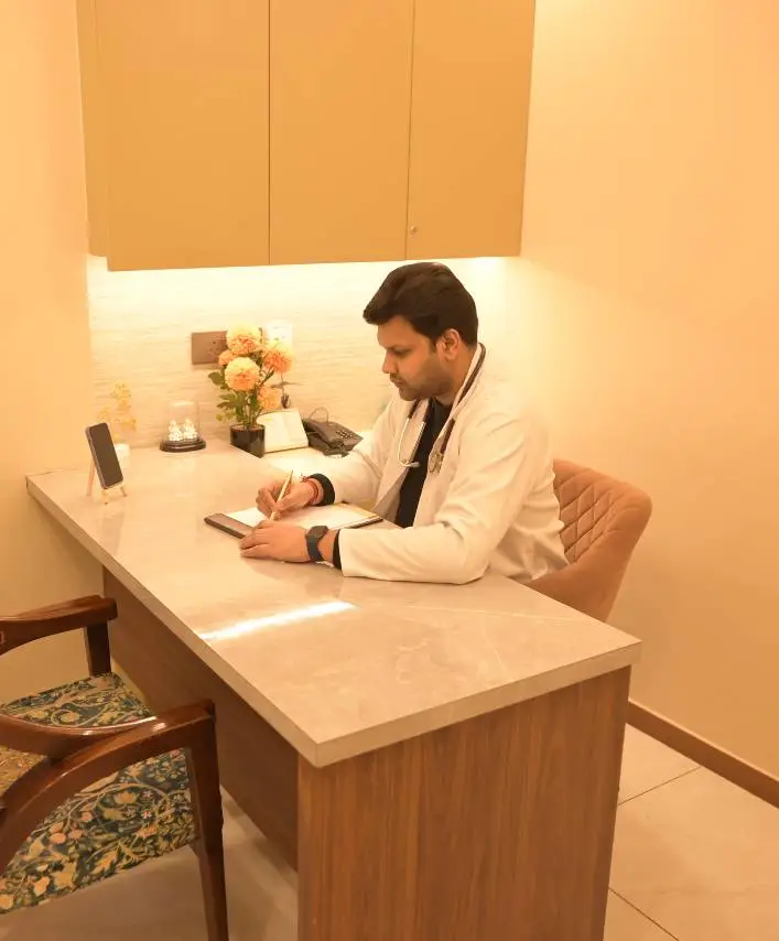 psychiatrist dr ashish writing a prescription for a patient